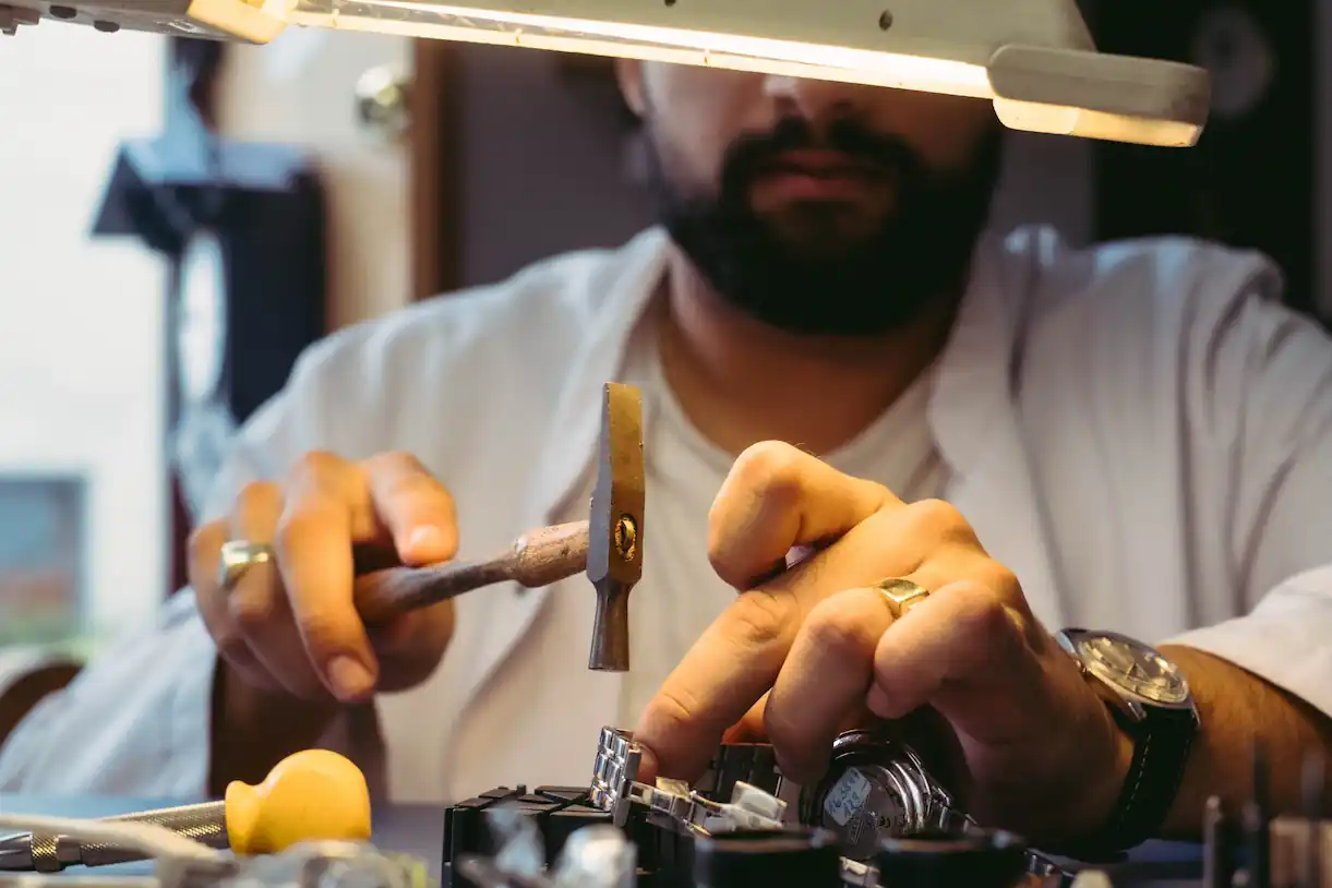 Magd Haddad repairing a watch